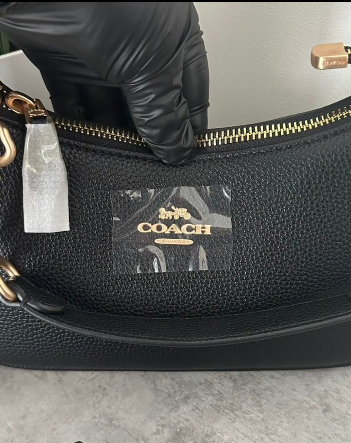 Teri – Classic Black Shoulder Bag with Refined Gold Details