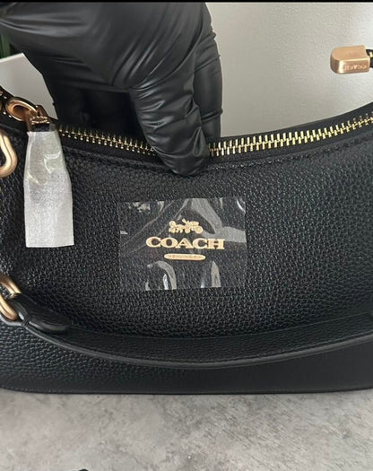 Teri – Classic Black Shoulder Bag with Refined Gold Details