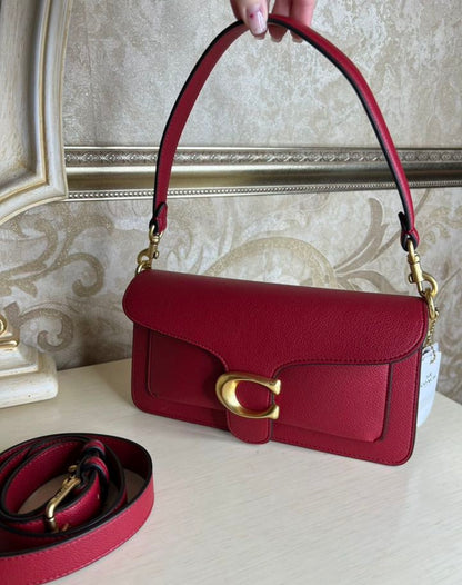 Heritage Compact Shoulder Bag in Deep Carmine with Sculpted Gold Emblem