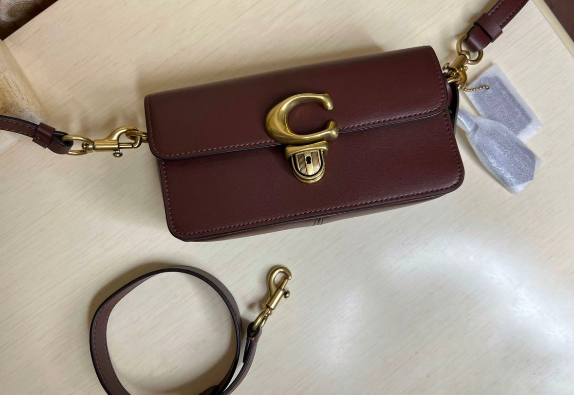 Heritage Compact Shoulder Bag in Classic Chestnut with Sculpted Gold Emblem
