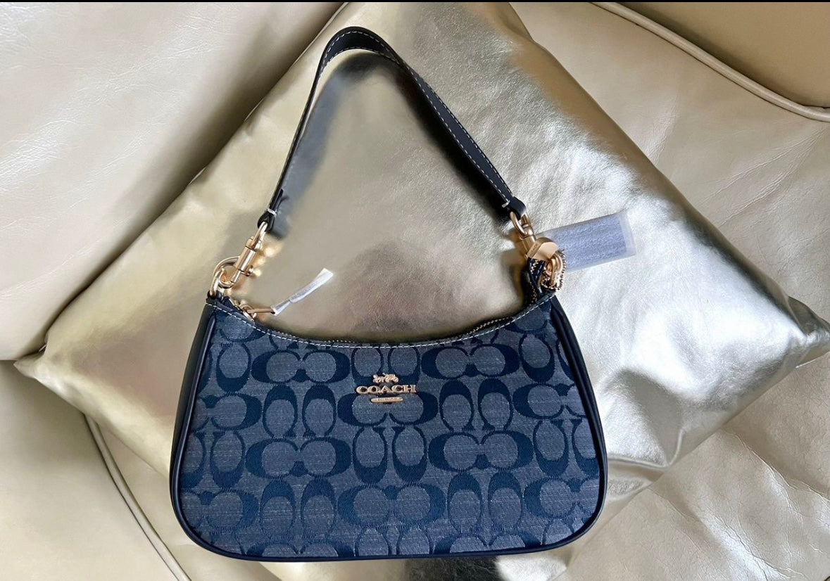 Teri — Soft Blue Signature Shoulder Bag with Gold Accents