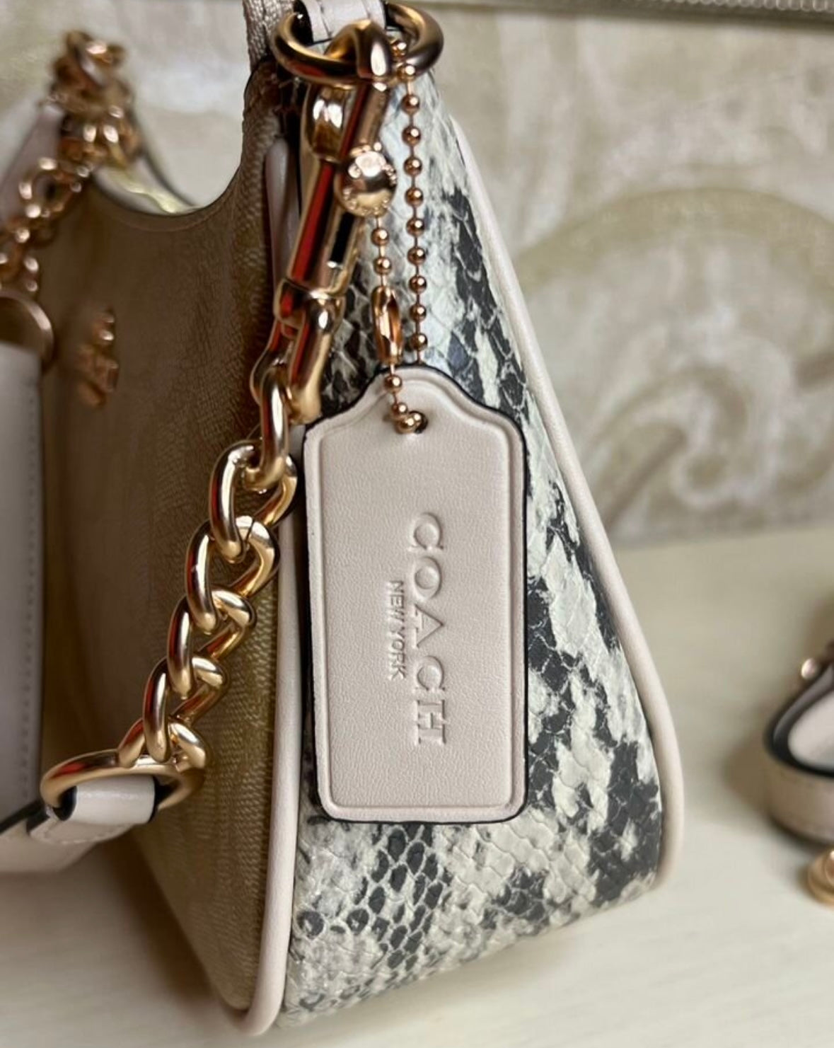 Heritage Mini Shoulder Bag in Soft Sand with Sculpted Gold Chain Contrast Textures