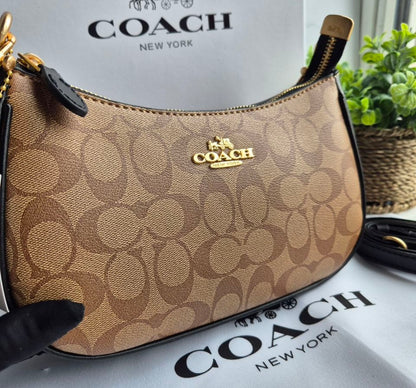 Teri Shoulder Bag — Elegant Signature Canvas in Tan with Gold Accents