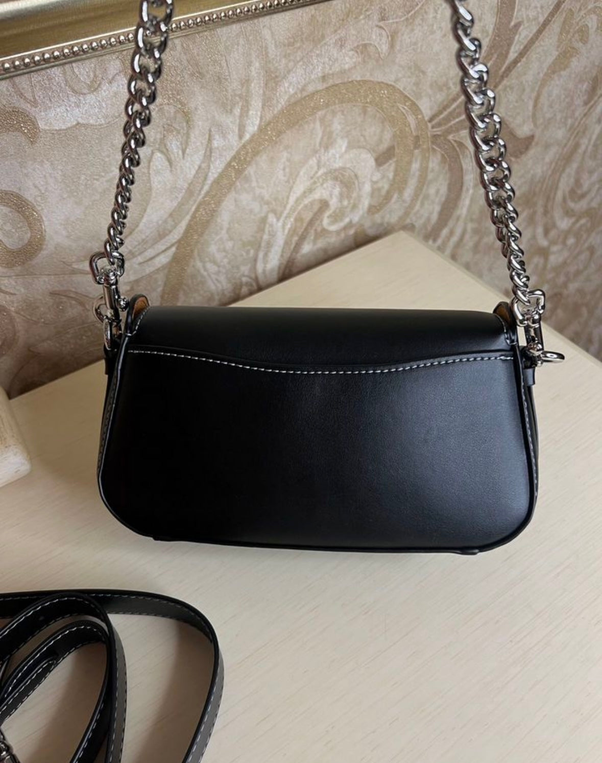 Heritage Mini Chain Shoulder Bag in Obsidian Black with Sculpted Buckle Detail