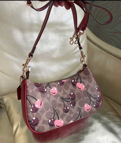 Teri Cherry Edition — Playful Mini Shoulder Bag with Signature Print Red Leather Accents