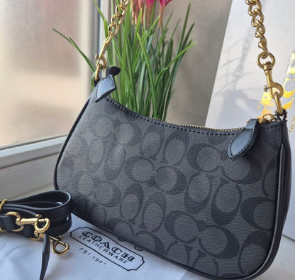 Teri Shoulder Bag — Classic Black Signature Canvas with Gold Accents