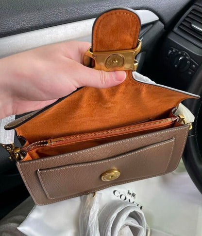 Heritage Compact Shoulder Bag in Warm Taupe with Sculpted Gold Emblem