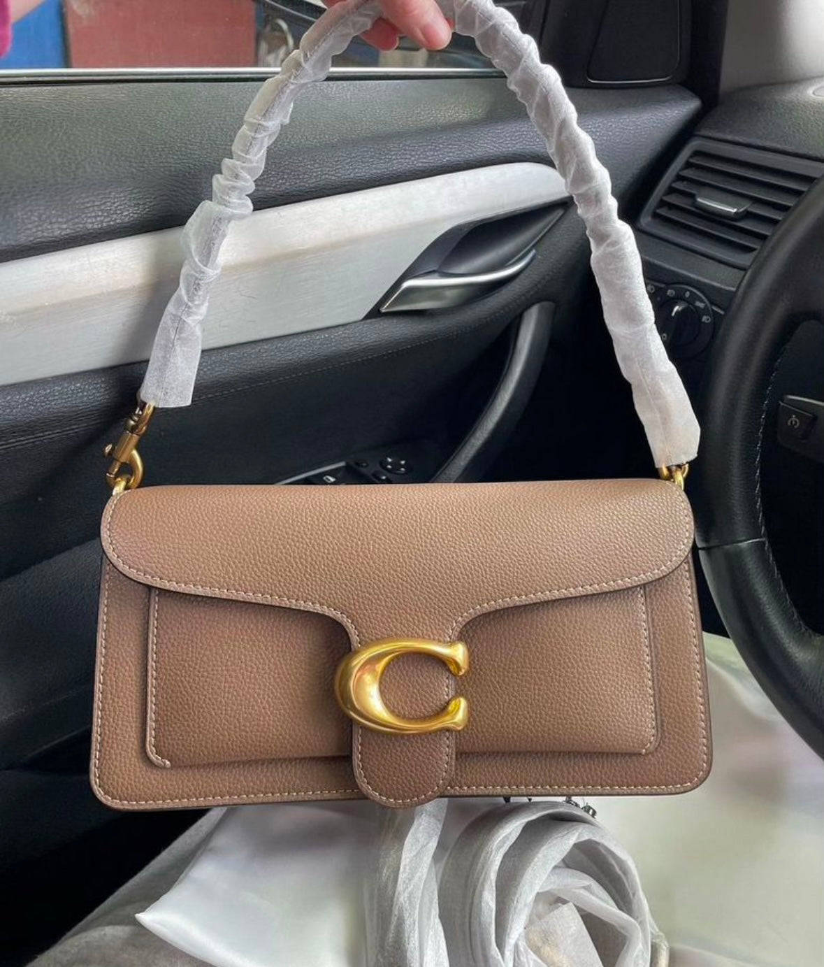 Heritage Compact Shoulder Bag in Warm Taupe with Sculpted Gold Emblem