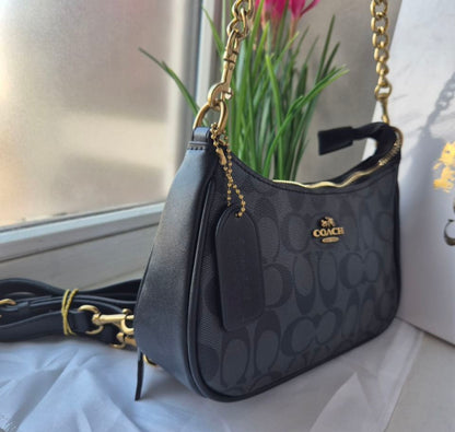 Teri Shoulder Bag — Classic Black Signature Canvas with Gold Accents