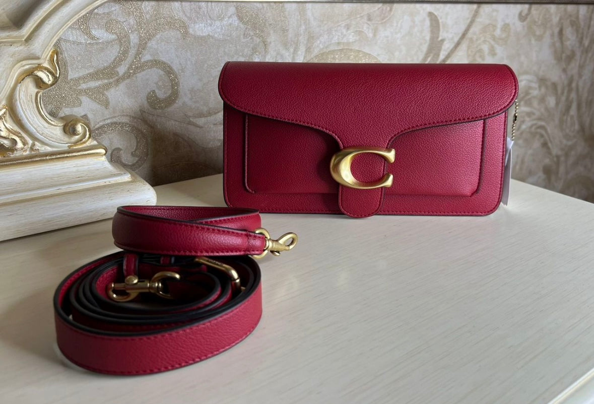 Heritage Compact Shoulder Bag in Deep Carmine with Sculpted Gold Emblem