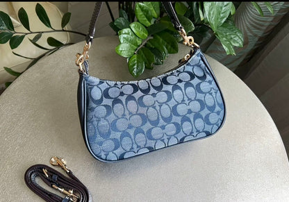 Teri — Soft Blue Signature Shoulder Bag with Gold Accents