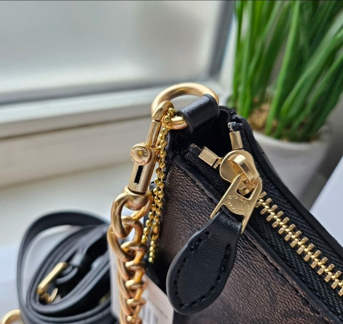 Teri Shoulder Bag — Signature Canvas with Black and Brown Accents