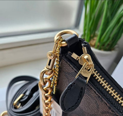 Teri Shoulder Bag — Signature Canvas with Black and Brown Accents