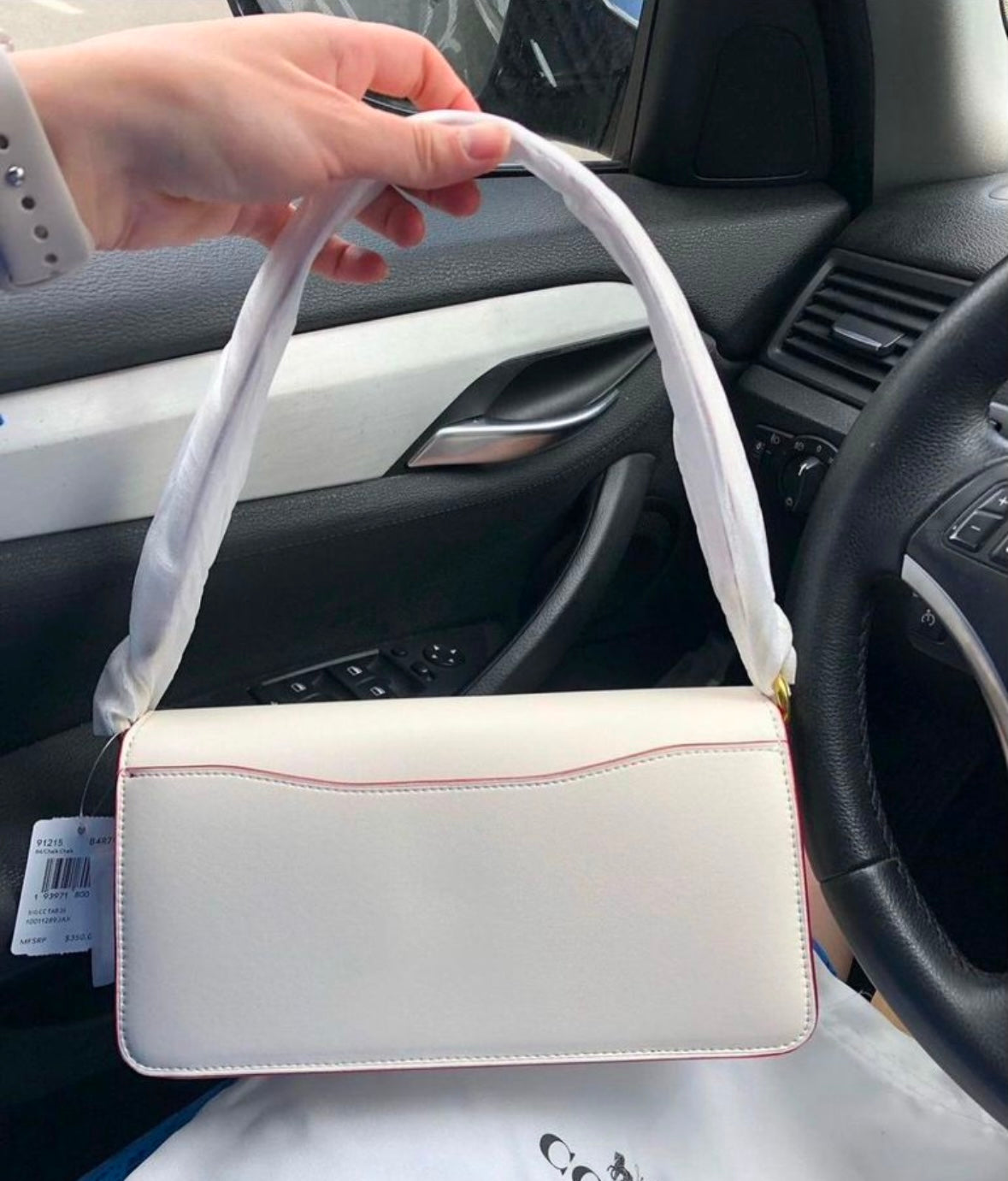 Heritage Compact Shoulder Bag in Soft Ivory with Sculpted Gold Emblem Contrast Paneling