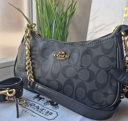 Teri Shoulder Bag — Classic Black Signature Canvas with Gold Accents