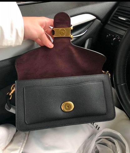 Heritage Structured Shoulder Bag in Deep Noir with Sculpted Gold Emblem