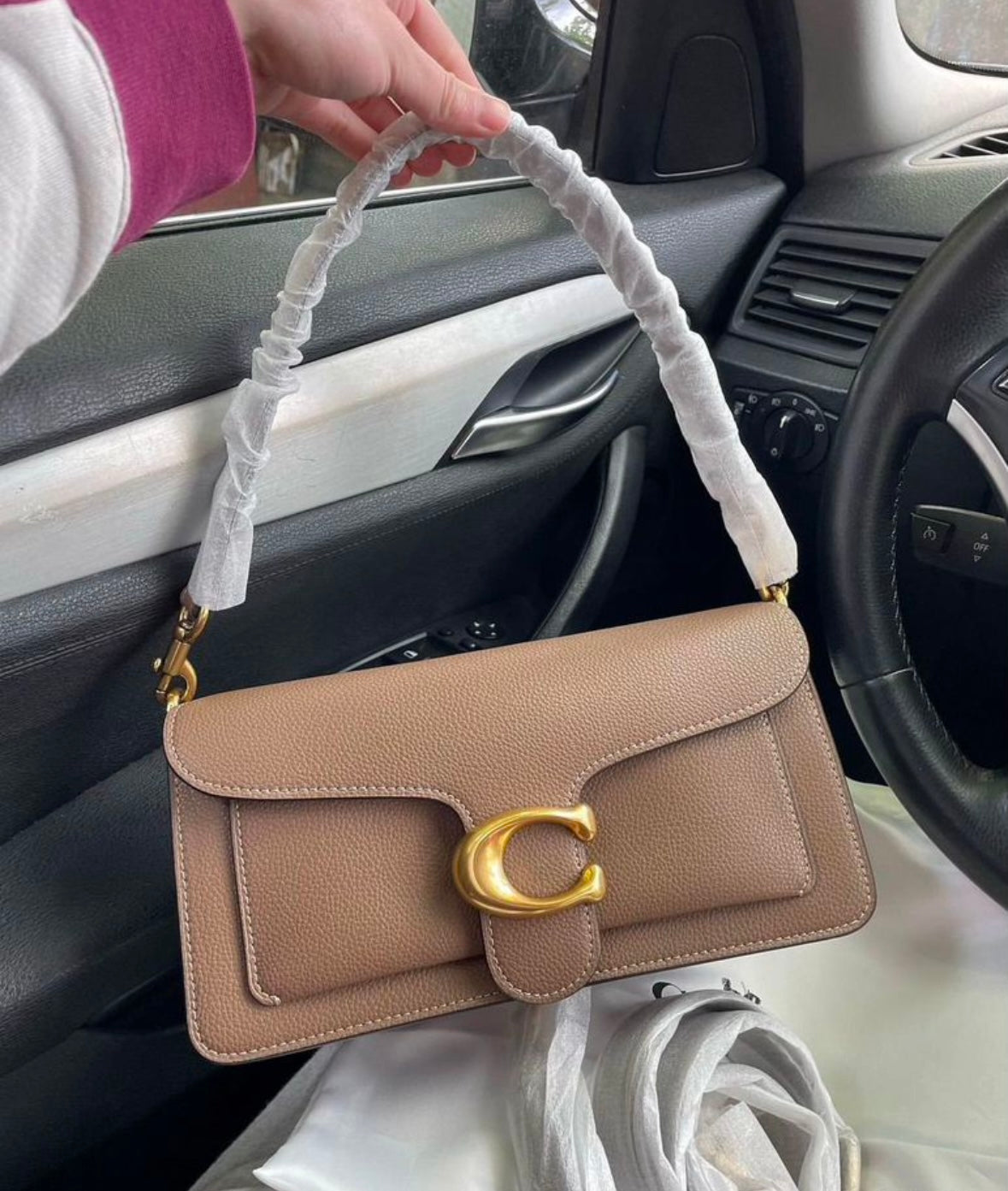 Heritage Compact Shoulder Bag in Warm Taupe with Sculpted Gold Emblem