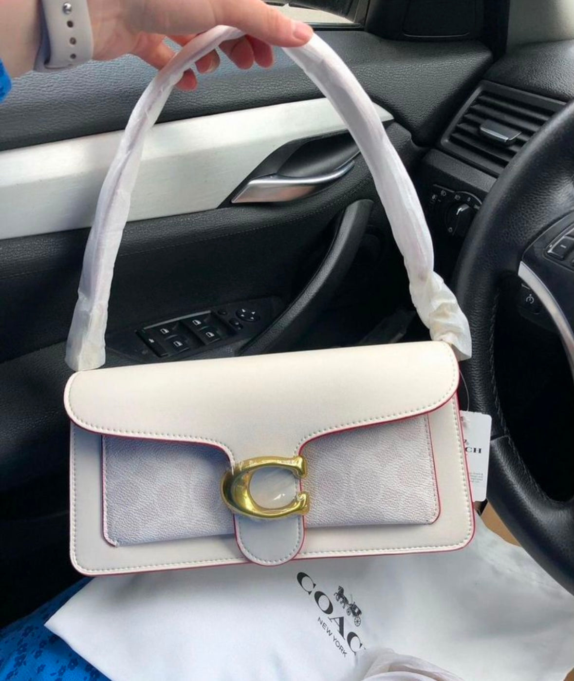 Heritage Compact Shoulder Bag in Soft Ivory with Sculpted Gold Emblem Contrast Paneling