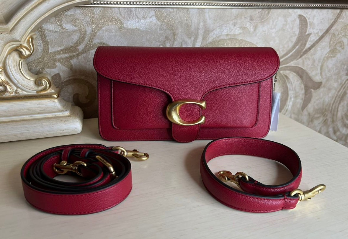 Heritage Compact Shoulder Bag in Deep Carmine with Sculpted Gold Emblem