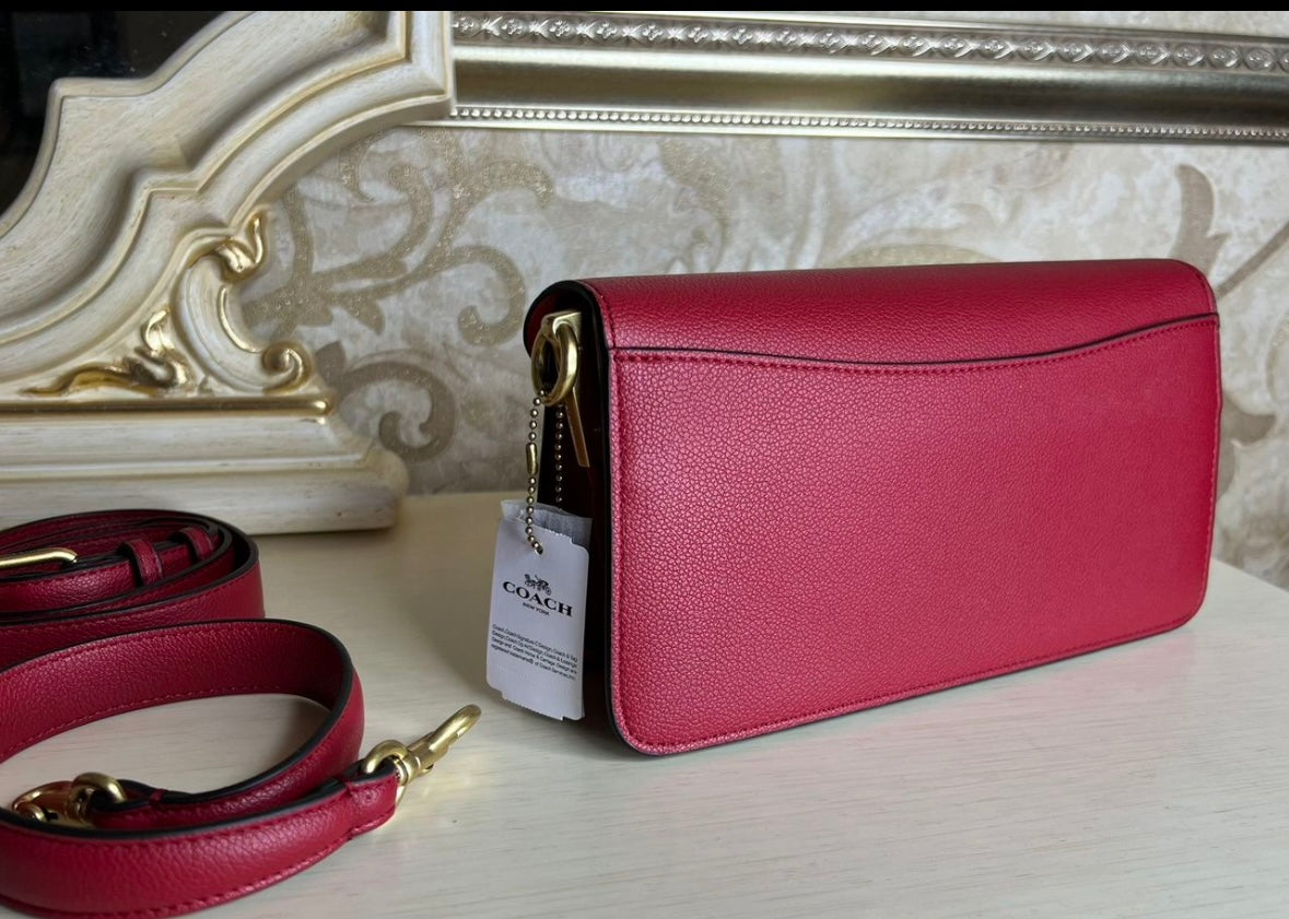 Heritage Compact Shoulder Bag in Deep Carmine with Sculpted Gold Emblem