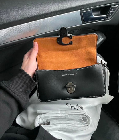 Heritage Compact Shoulder Bag in Midnight Black with Sculpted Gunmetal Emblem