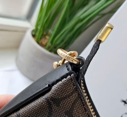 Teri Shoulder Bag — Signature Canvas with Black and Brown Accents